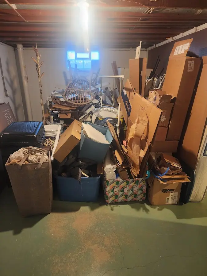 Roll-off dumpster container at job site for 2 Yard Dumpster Rental in Sandwich